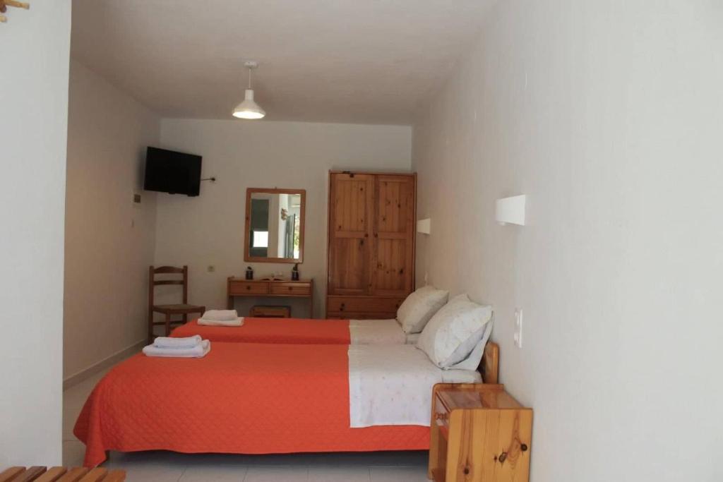 Un pat sau paturi într-o cameră la Dioni Lux inn 2