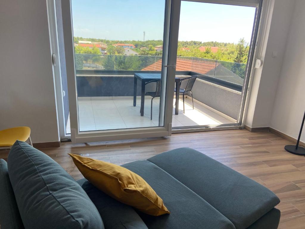 Balkón alebo terasa v ubytovaní Daniela Family Apartment - top floor - new & quite location - great sea & island view