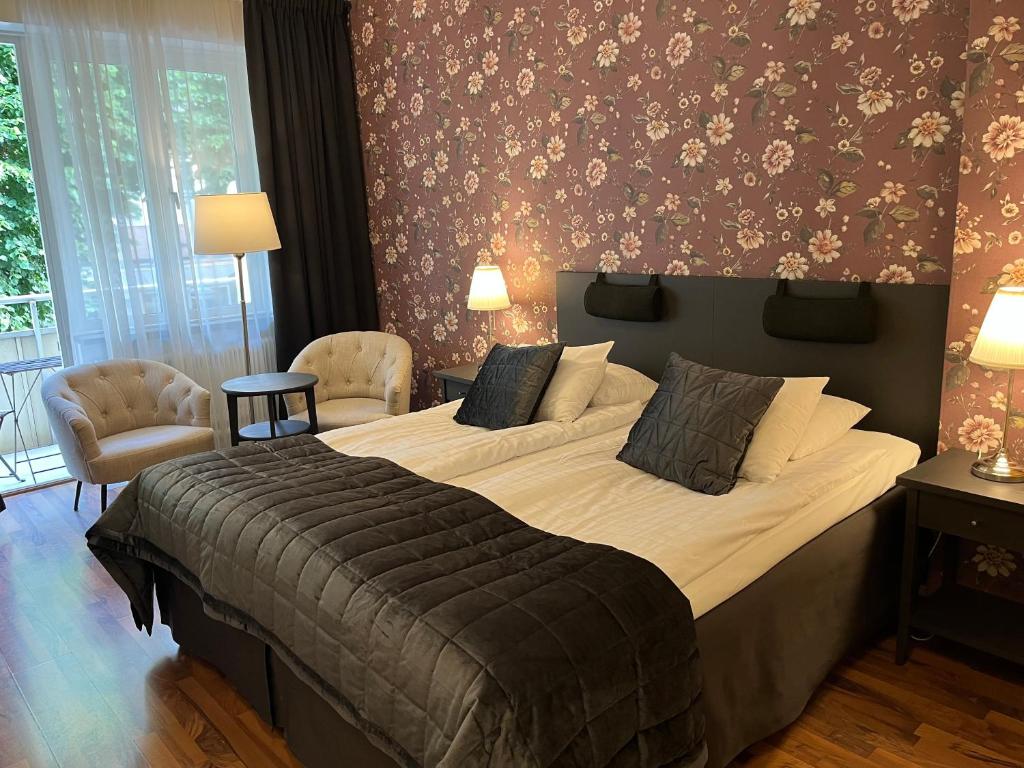 Postel nebo postele na pokoji v ubytování Hotell Bele
