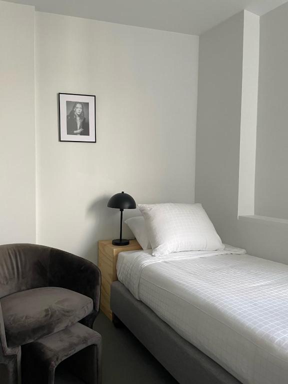Postel nebo postele na pokoji v ubytování Hotel National Antwerp