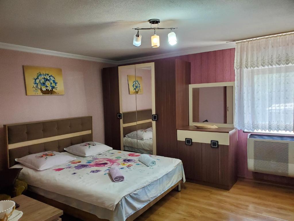 Postel nebo postele na pokoji v ubytování Guesthouse Vashlovani