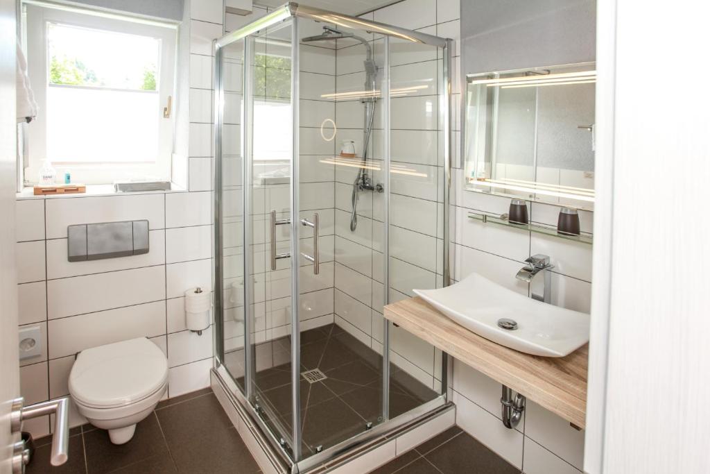 Koupelna v ubytování Hotel Brunnenbach