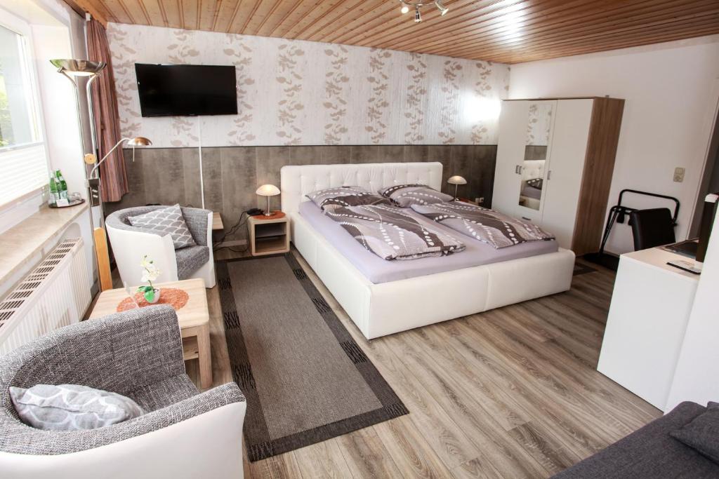 Postel nebo postele na pokoji v ubytování Hotel Brunnenbach