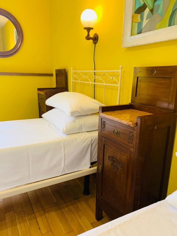 Posteľ alebo postele v izbe v ubytovaní Casa Robina