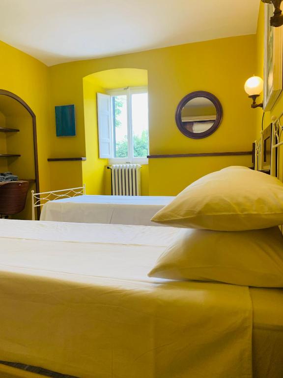 Posteľ alebo postele v izbe v ubytovaní Casa Robina