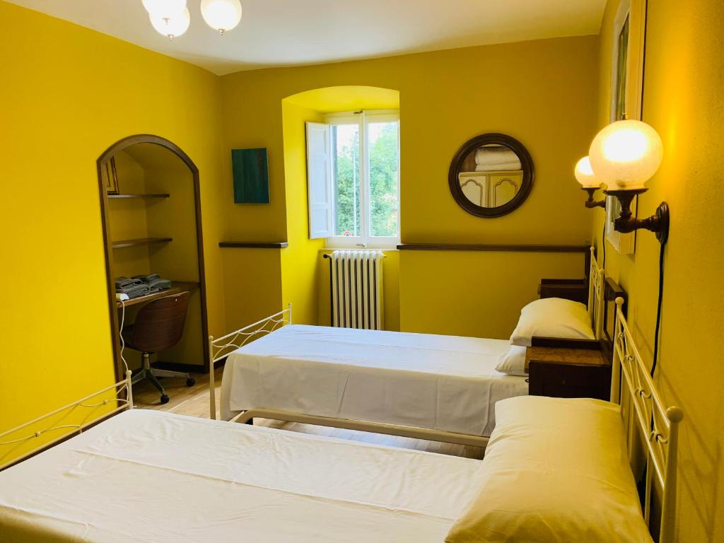 Posteľ alebo postele v izbe v ubytovaní Casa Robina