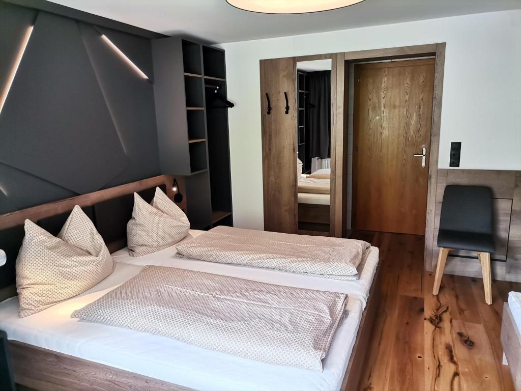 Posteľ alebo postele v izbe v ubytovaní Haus Tuklar