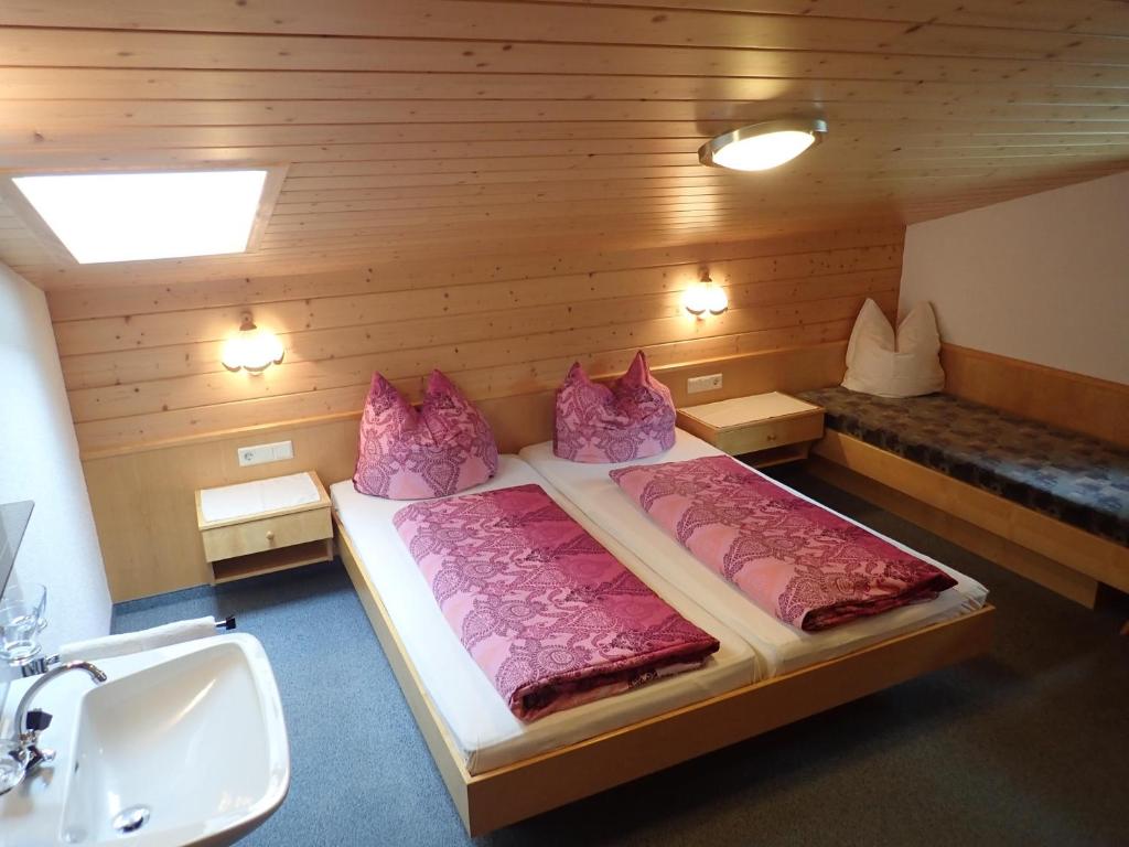 Posteľ alebo postele v izbe v ubytovaní Haus Tuklar