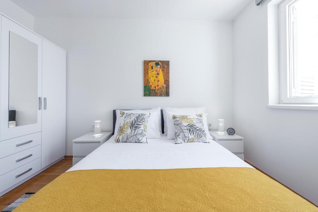 Posteľ alebo postele v izbe v ubytovaní Fortuna apartment