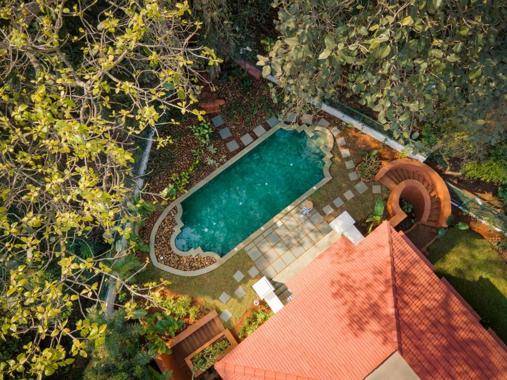 Πισίνα στο ή κοντά στο Villa Cardo 4 BHK in Assagao with Huge Private Pool & Big Garden Standalone Villa with Caretaker & Security