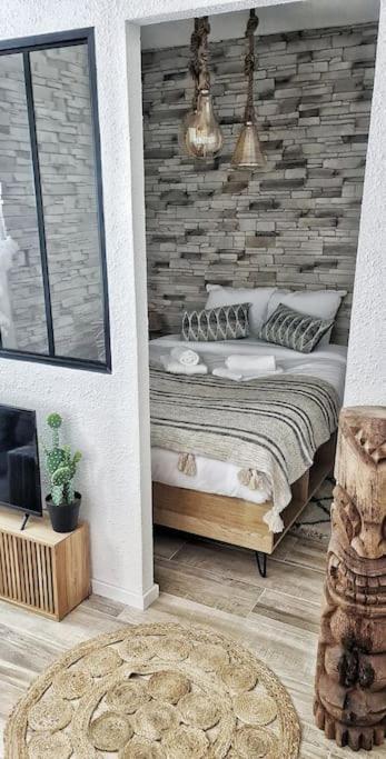 Posteľ alebo postele v izbe v ubytovaní #NEW#TERRASSE SUD OUEST#PIED DE LA CITÉ #1
