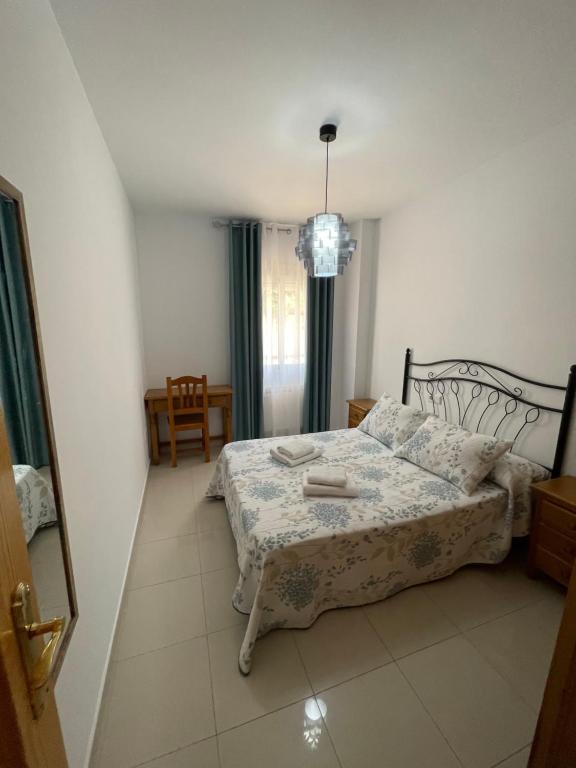 Posteľ alebo postele v izbe v ubytovaní Atico HouseGom
