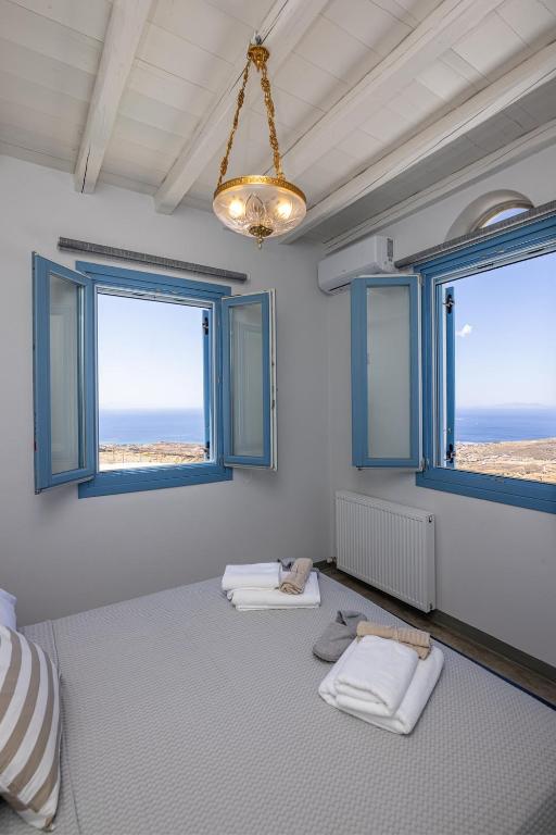 Postel nebo postele na pokoji v ubytování Aegean Muses