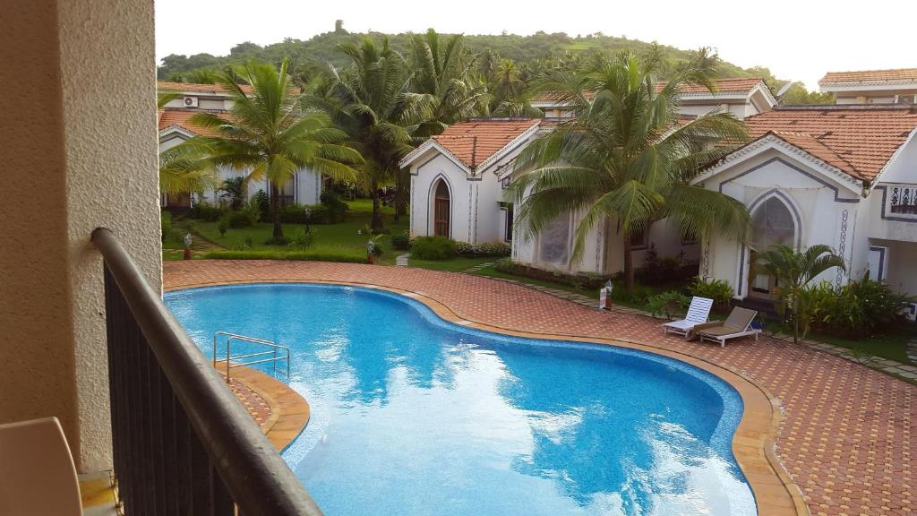 Bazén v ubytování Casa Legend Villa & Apartments Arpora - Baga - Goa nebo v jeho okolí