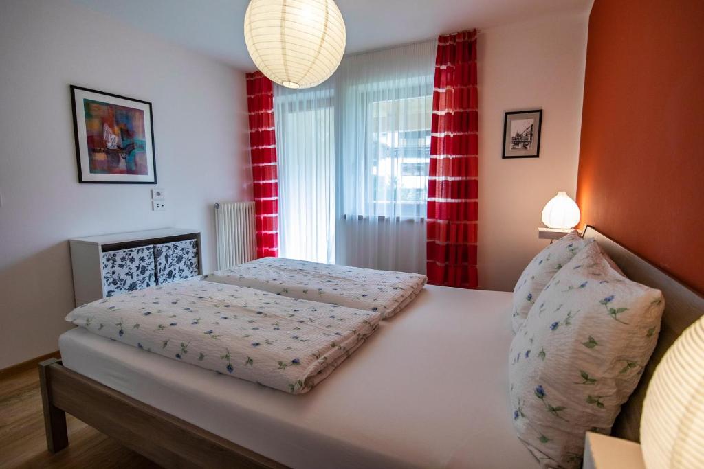 Posteľ alebo postele v izbe v ubytovaní Apartment ARGENTIS Krumas-Living - Kronplatz