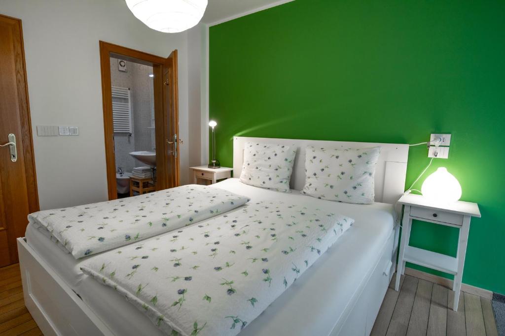 Posteľ alebo postele v izbe v ubytovaní Apartment ARGENTIS Krumas-Living - Kronplatz