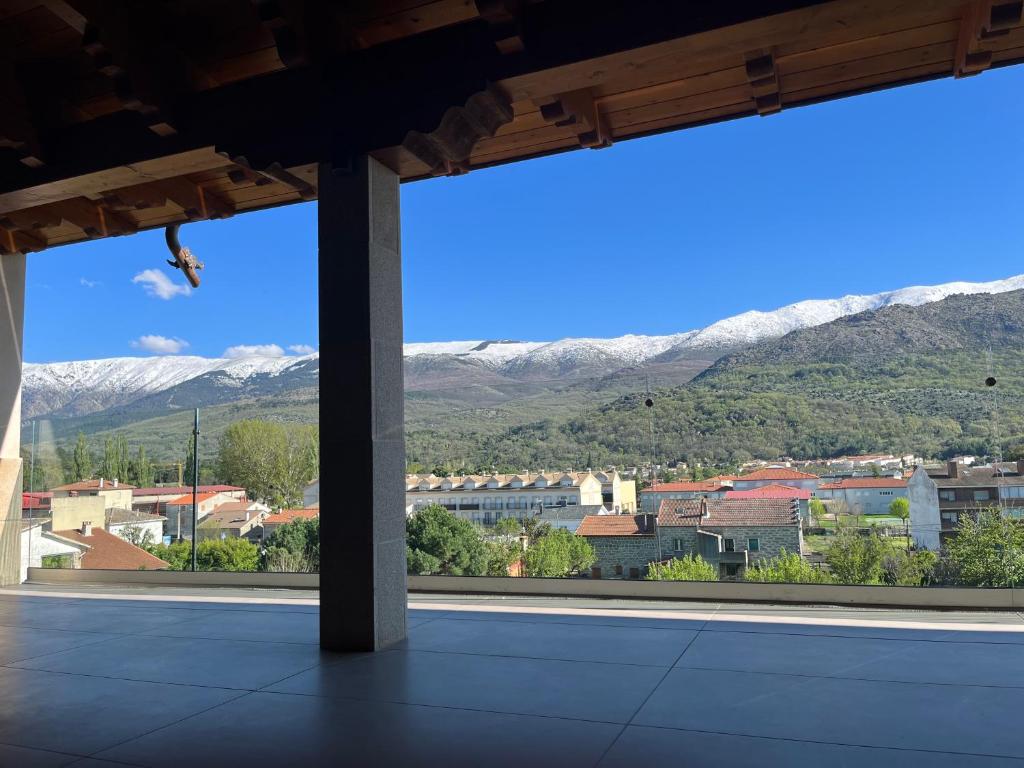 a view from a room with a view of mountains at El Mirador de Gredos 3 in Navaluenga