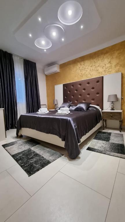 Postel nebo postele na pokoji v ubytování Villa Natka