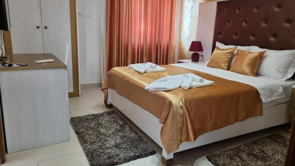 Postel nebo postele na pokoji v ubytování Villa Natka