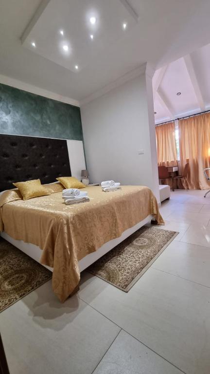 Postel nebo postele na pokoji v ubytování Villa Natka