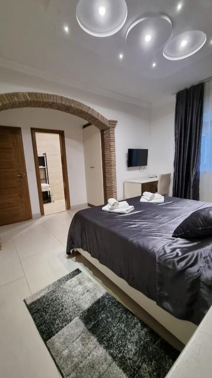 Postel nebo postele na pokoji v ubytování Villa Natka