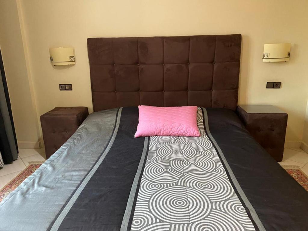 Кровать или кровати в номере Hôtel Atlas Guercif
