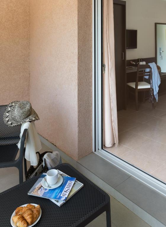 TV a/nebo společenská místnost v ubytování Hotel U Ricordu & Spa