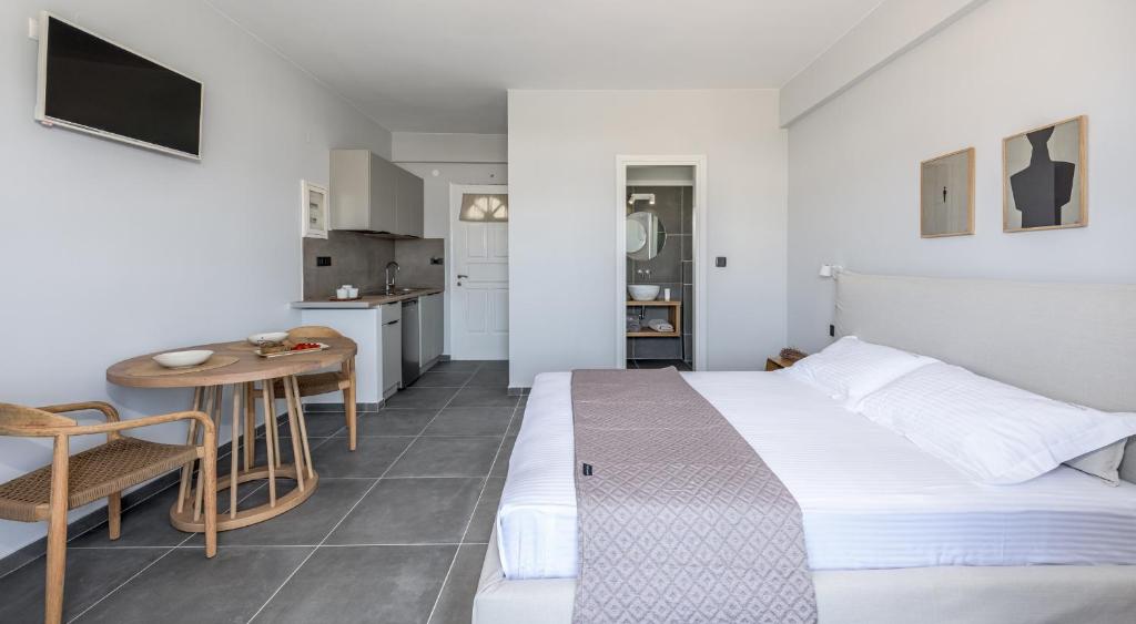 Postel nebo postele na pokoji v ubytování Hotel Ippocampos Studios