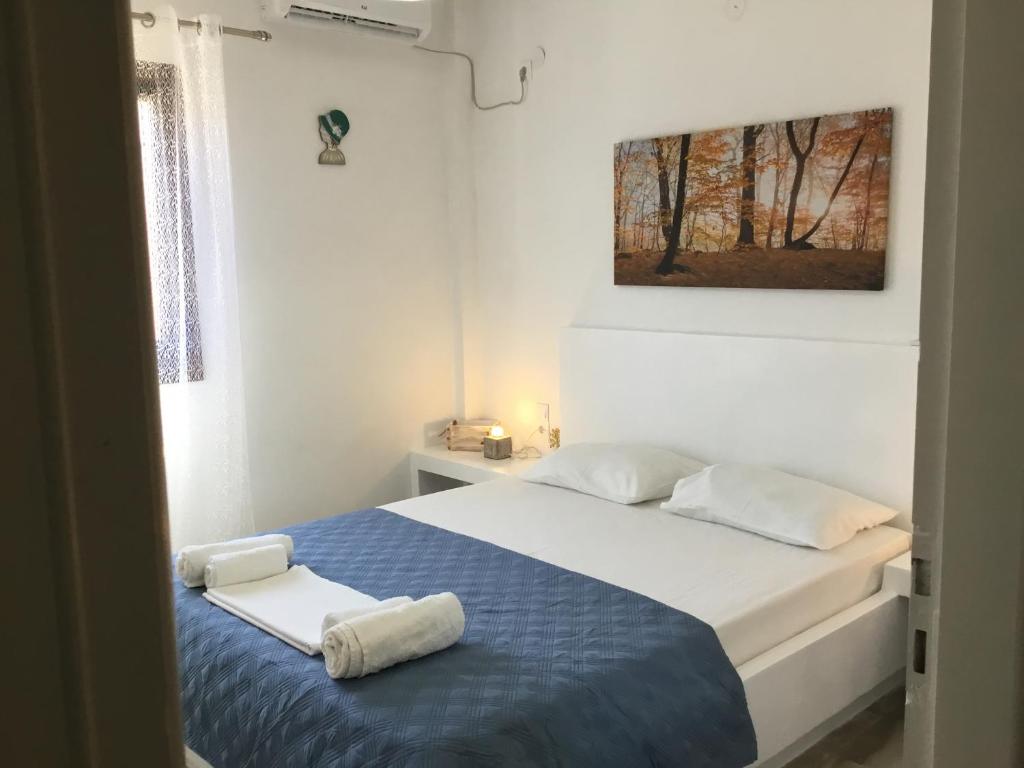 Postel nebo postele na pokoji v ubytování VILLA LEMONIA