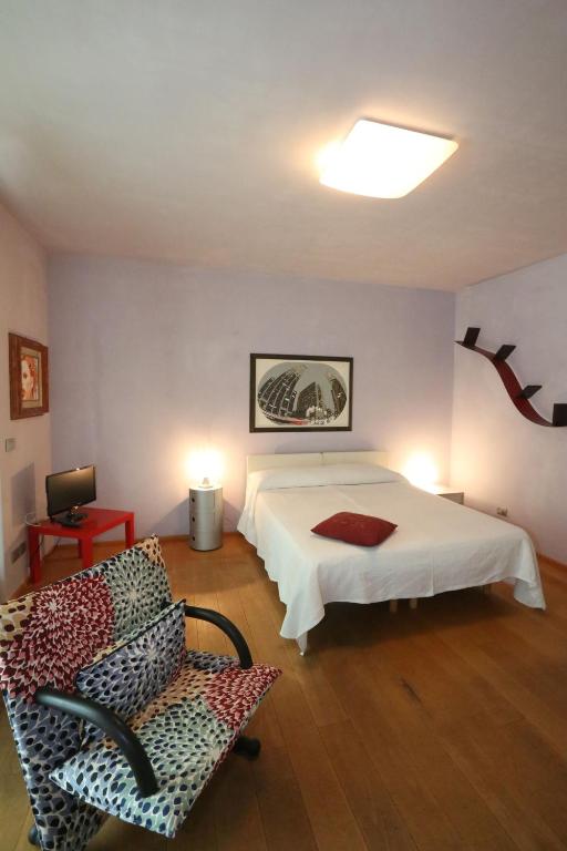 Postel nebo postele na pokoji v ubytování A Casa di Maria