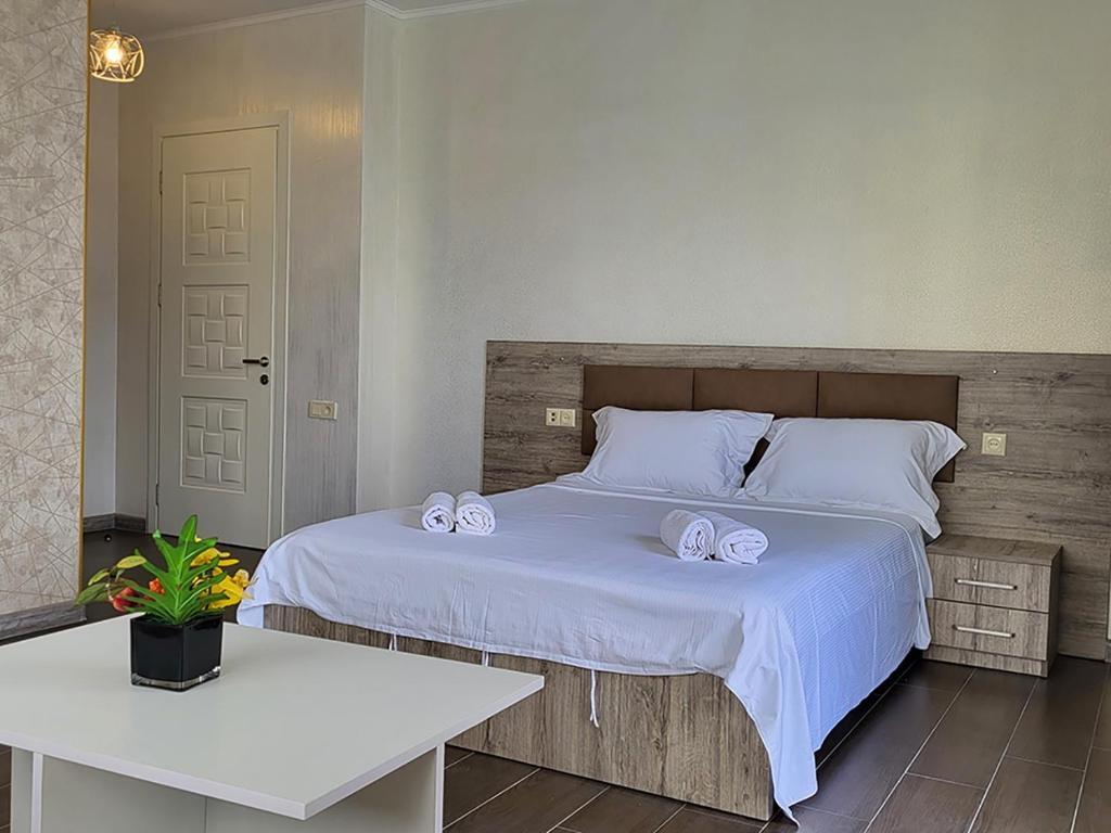 Postel nebo postele na pokoji v ubytování MITE Hotel
