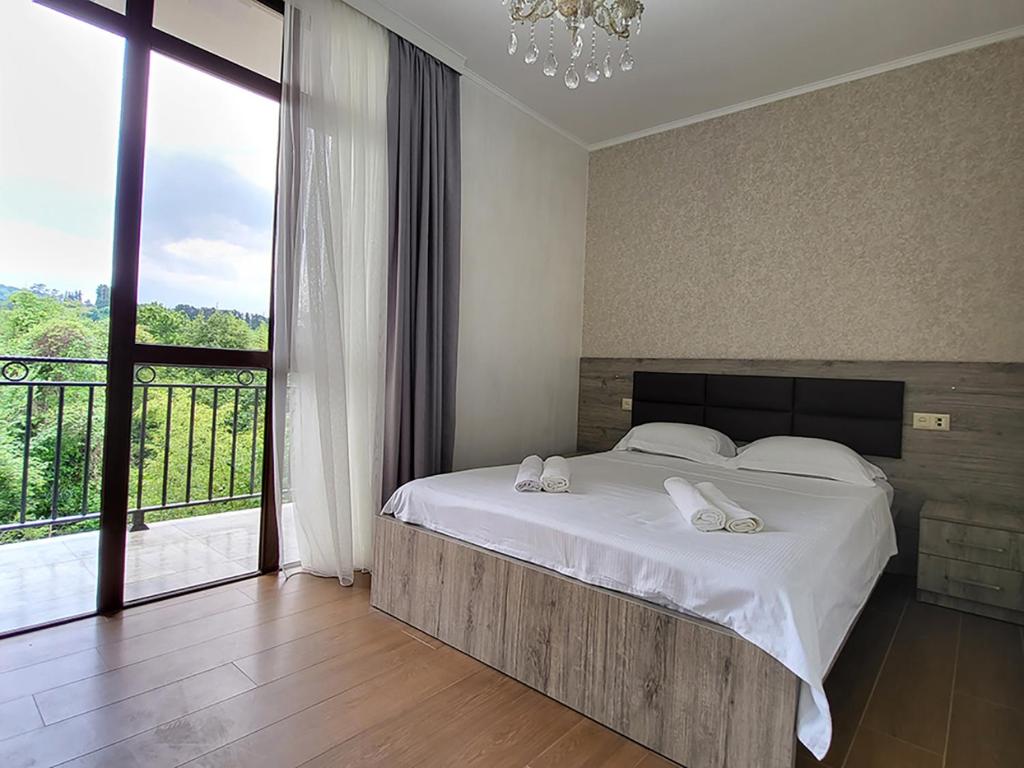 Postel nebo postele na pokoji v ubytování MITE Hotel