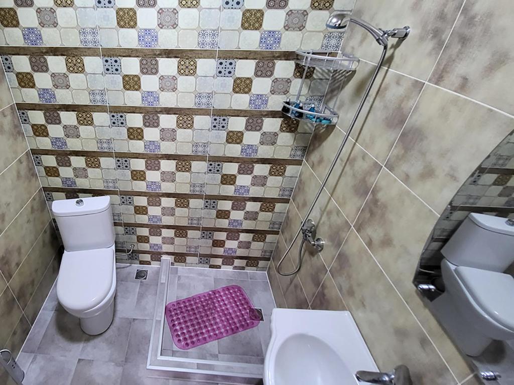 Koupelna v ubytování MITE Hotel