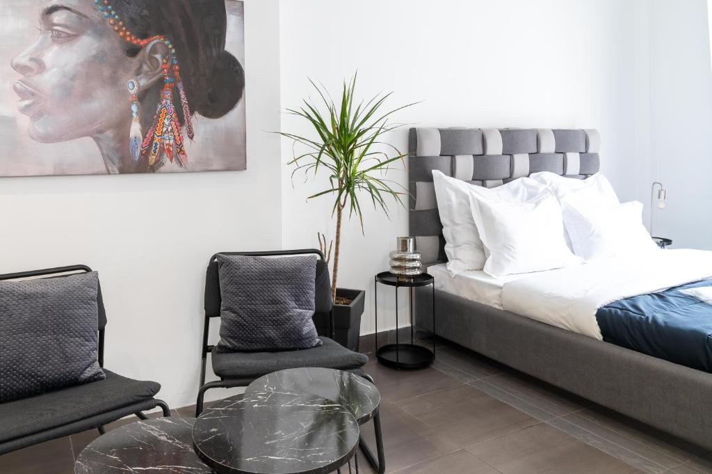 Posteľ alebo postele v izbe v ubytovaní Monastiraki Sweet House 1