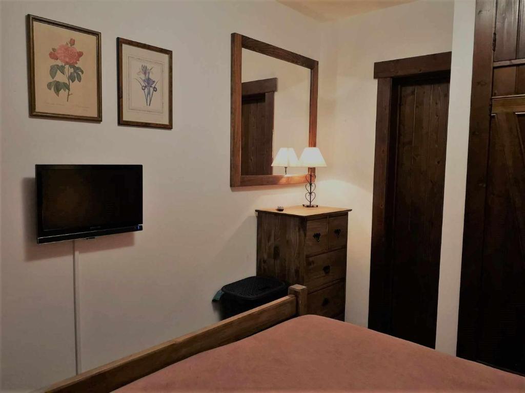 TV a/nebo společenská místnost v ubytování Vivenda Xavier - Casa de férias com vistas deslumbrantes