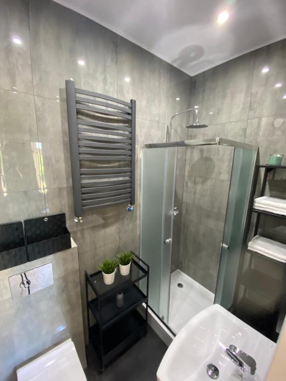 Kúpeľňa v ubytovaní Apartamenty "CENTRUM" Mrągowo Mazury