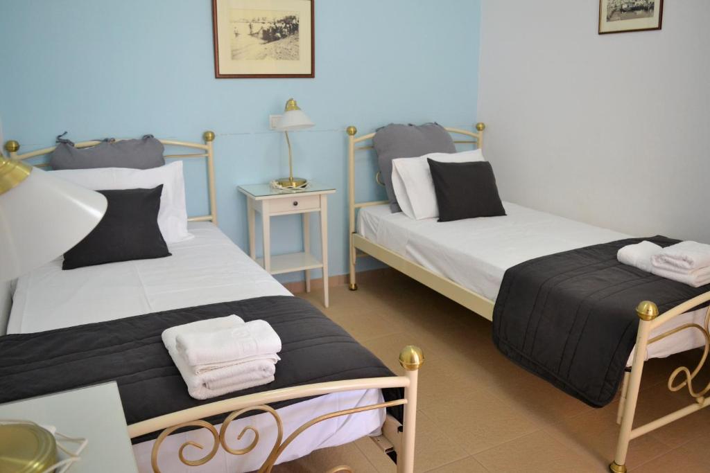 Posteľ alebo postele v izbe v ubytovaní Mer Bleu Apartments