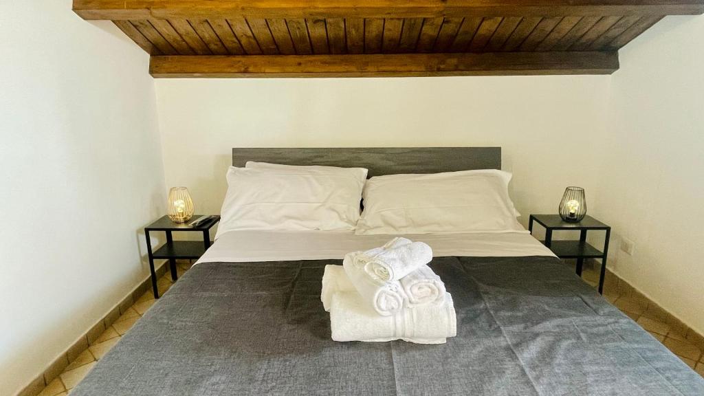 Postel nebo postele na pokoji v ubytování Dimora La Torre