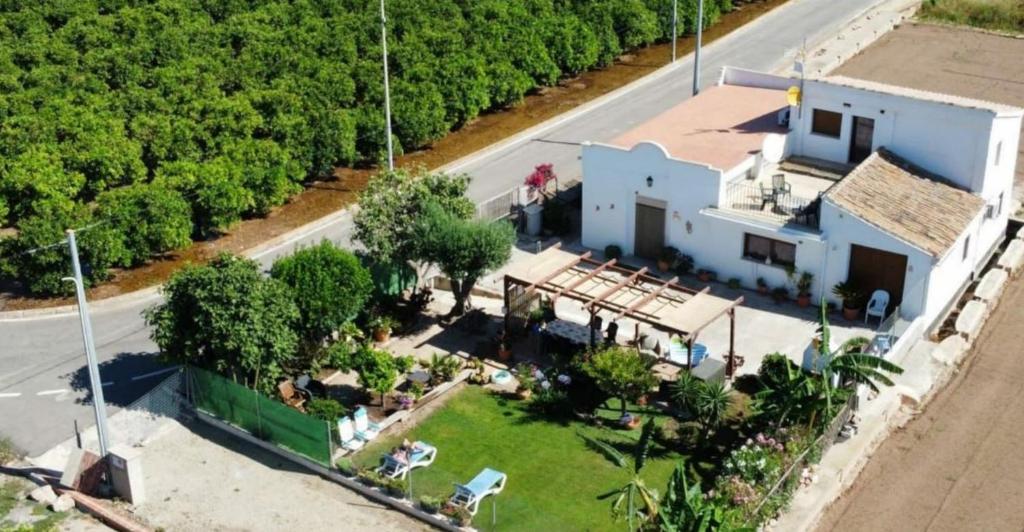 an aerial view of a house with a yard at Ca Emma in Mahuella