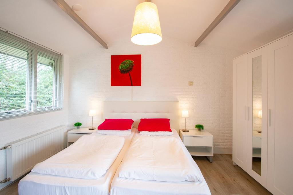 Postel nebo postele na pokoji v ubytování Garnekuul 26 Callantsoog