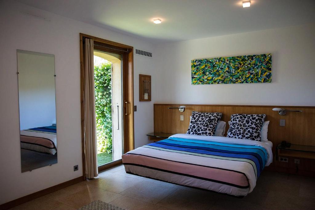 Postel nebo postele na pokoji v ubytování BASTIDE DE RAMATUELLE