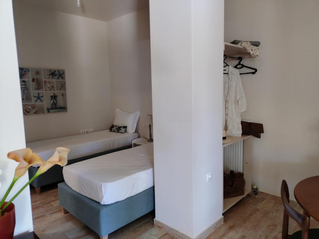 Postel nebo postele na pokoji v ubytování KLADIS HOME