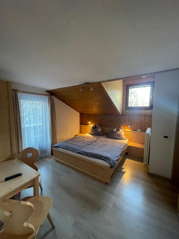 Postel nebo postele na pokoji v ubytování Lamirì