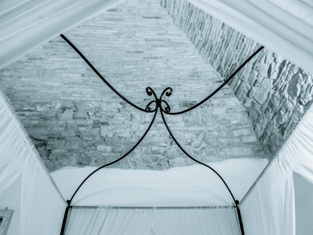 Postel nebo postele na pokoji v ubytování I Templari di Alberona