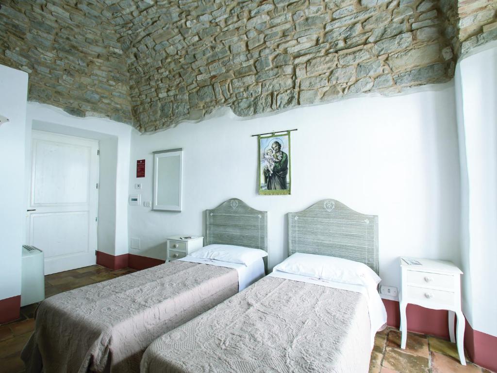 Postel nebo postele na pokoji v ubytování I Templari di Alberona