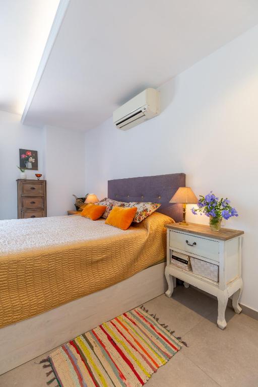 Postel nebo postele na pokoji v ubytování Harmony Villa by Fidalsa