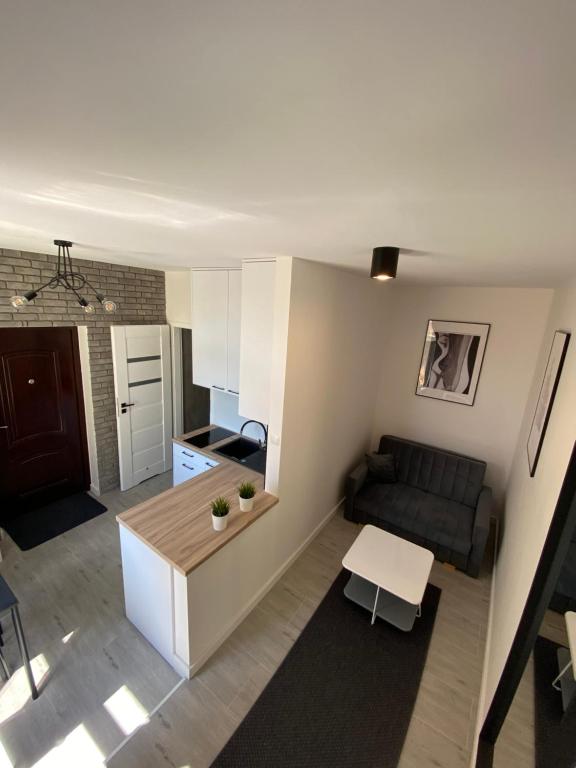 Kuchyňa alebo kuchynka v ubytovaní Apartamenty "CENTRUM" Mrągowo Mazury
