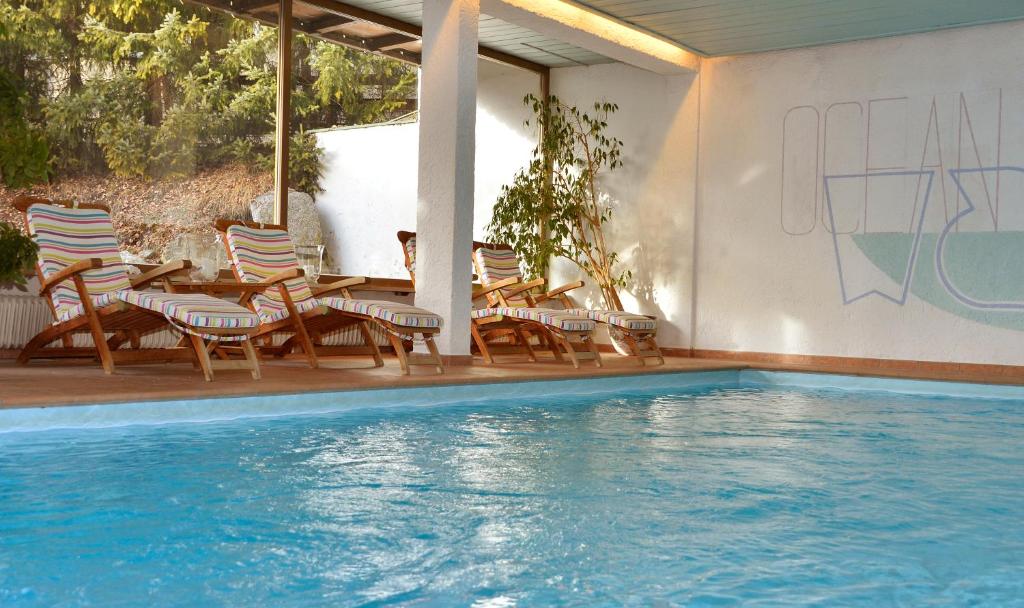 Bazén v ubytování Hotel Christina nebo v jeho okolí