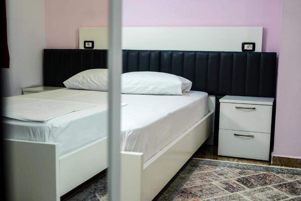 Postel nebo postele na pokoji v ubytování Hotel Magic