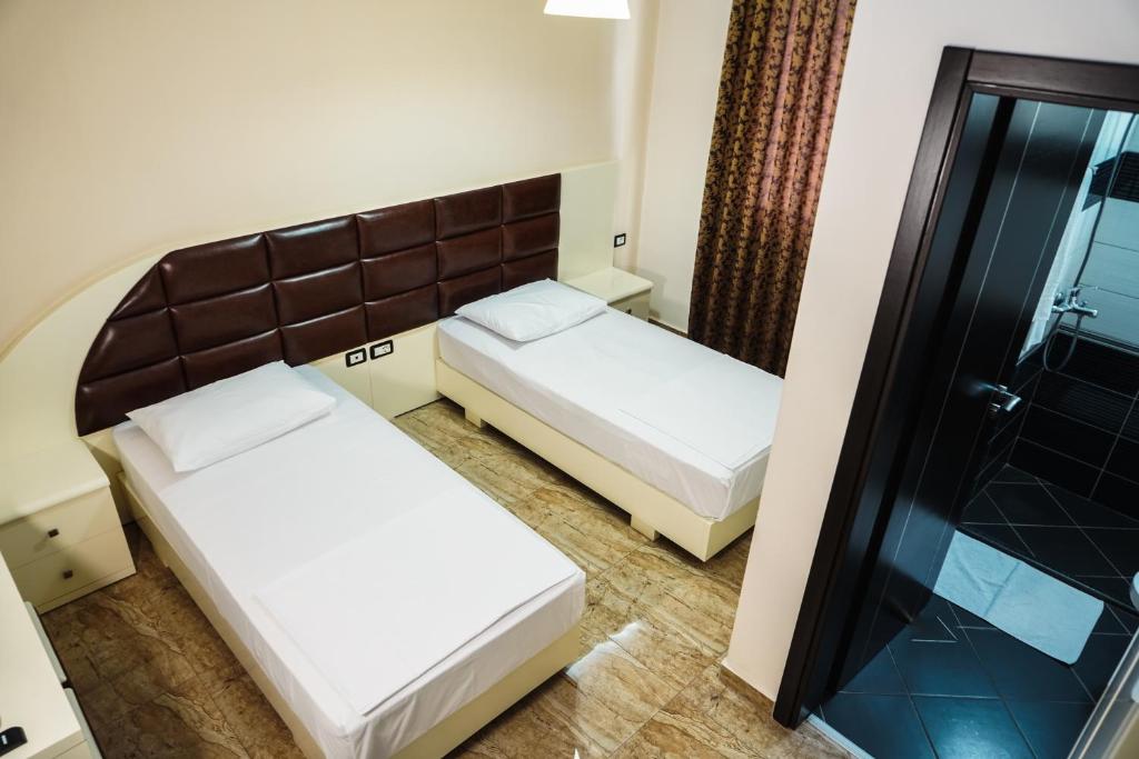 Cama o camas de una habitación en Hotel Magic